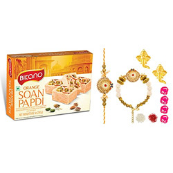 Feastive Celebrations Bikano Soan Papdi with a Bhaiya Bhabhi Rakhi Loomba Set
