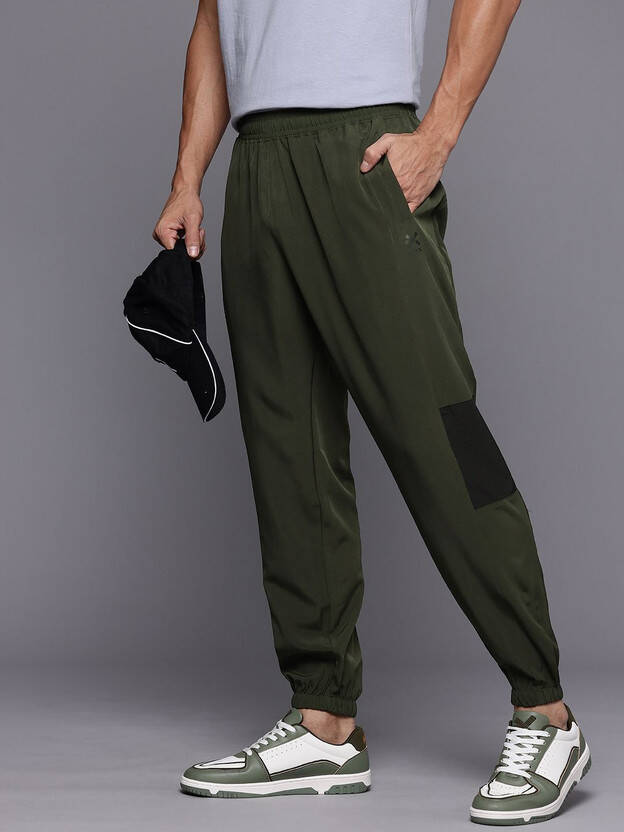 Men Solid Green Track Pants